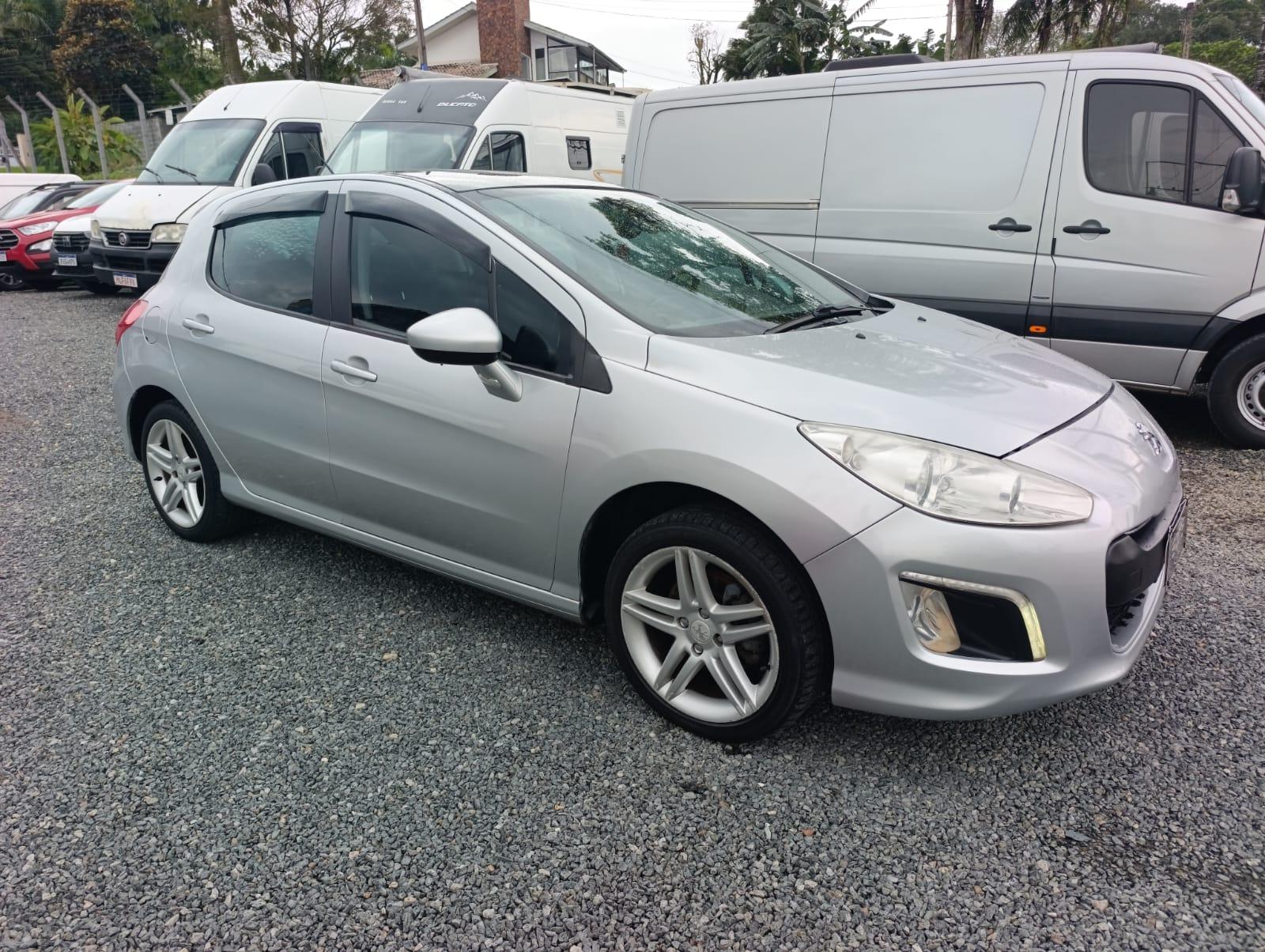 Peugeot 308 Feline 2013 — foto 1 de 20